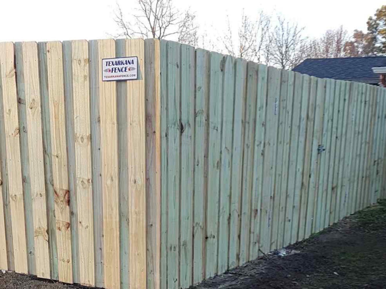 Lewisville AK Shadowbox style wood fence